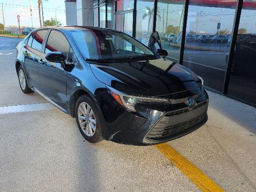 Midnight Black Metallic 2024 Toyota Corolla Hybrid SE