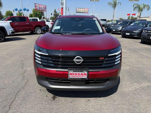 Scarlet Ember Tintcoat 2026 Nissan Kicks SR