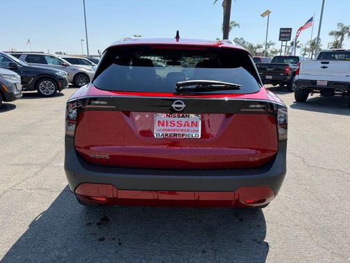 Scarlet Ember Tintcoat 2026 Nissan Kicks SR