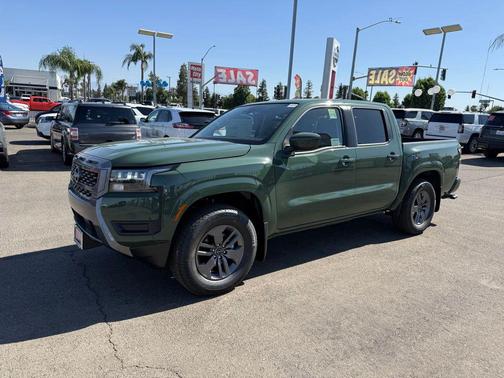 Green Metallic 2026 Nissan Frontier SV