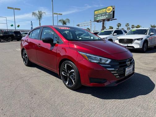 Scarlet Ember Tintcoat 2024 Nissan Versa 1.6 S