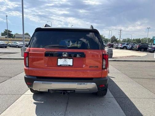 Orange 2026 Honda Passport TrailSport