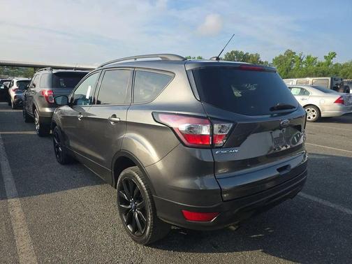 Ruby Red Metallic Tinted Clearcoat 2017 Ford Escape Titanium