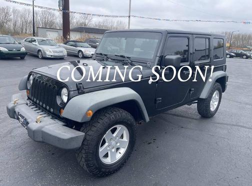 Black 2010 Jeep Wrangler Unlimited Sport
