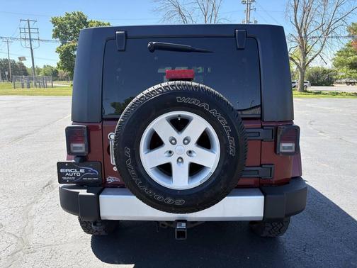Burgundy 2010 Jeep Wrangler Unlimited Sahara