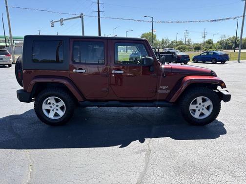 Burgundy 2010 Jeep Wrangler Unlimited Sahara