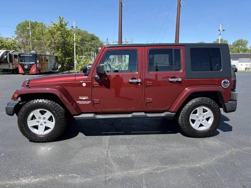 Burgundy 2010 Jeep Wrangler Unlimited Sahara