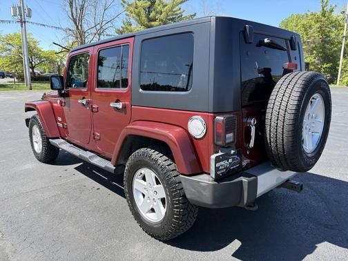 Burgundy 2010 Jeep Wrangler Unlimited Sahara