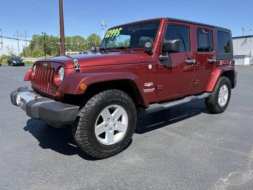 Burgundy 2010 Jeep Wrangler Unlimited Sahara