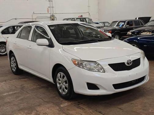 Super White 2010 Toyota Corolla LE