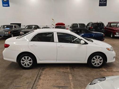 Super White 2010 Toyota Corolla LE