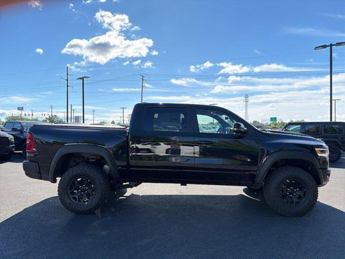 Diamond Black Crystal Pearlcoat 2026 RAM 1500 RHO Crew Cab 4x4 5'7' Box