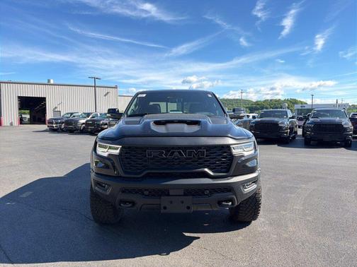 Diamond Black Crystal Pearlcoat 2026 RAM 1500 RHO Crew Cab 4x4 5'7' Box