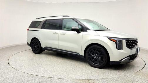 Ivory Silver 2025 Kia Carnival SX Prestige