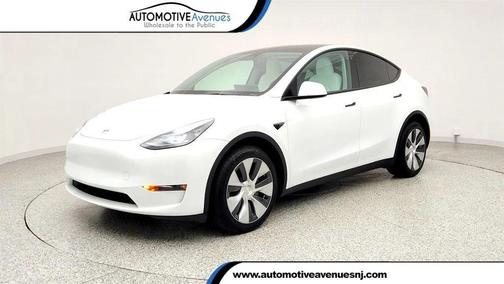 Pearl White Multi-Coat 2023 Tesla Model Y Long Range AWD w/ White/Black Premium Int. & Acceleration Boost