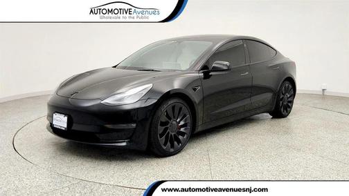Solid Black 2023 Tesla Model 3 Performance