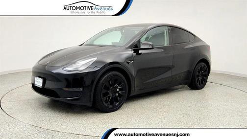 Solid Black 2024 Tesla Model Y Long Range Dual Motor All-Wheel Drive