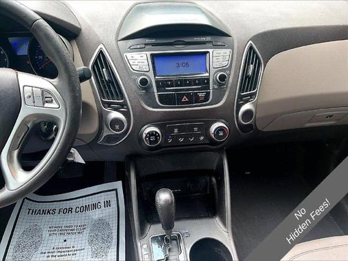 Garnet Red 2011 Hyundai TUCSON GLS