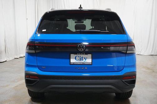 Cornflower Blue w/Deep Black Roof 2025 Volkswagen Taos 1.5T SE Black