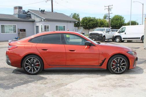 Sunset Orange Metallic 2023 BMW i4 Gran Coupe eDrive40