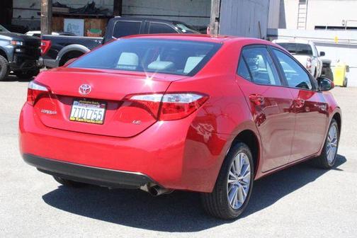 Barcelona Red Metallic 2015 Toyota Corolla LE Plus