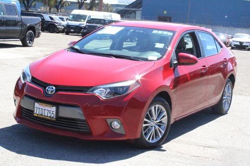 Barcelona Red Metallic 2015 Toyota Corolla LE Plus