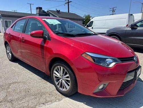 Barcelona Red Metallic 2015 Toyota Corolla LE Plus