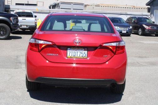 Barcelona Red Metallic 2015 Toyota Corolla LE Plus