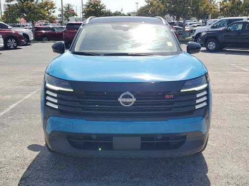 Arctic Ice Blue Metallic/Super Black 2025 Nissan Kicks SR