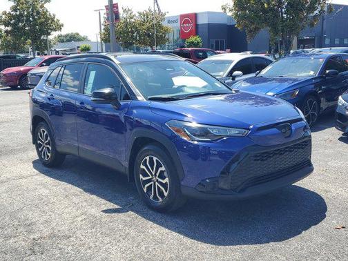 Blue Crush Metallic/Jet Black 2024 Toyota Corolla Hybrid SE