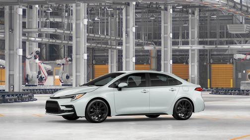 White 2026 Toyota Corolla Hybrid SE