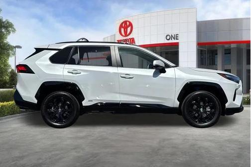 Beige 2025 Toyota RAV4 Hybrid SE