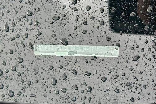 Wind Chill Pearl/Midnight Black Metallic 2024 Toyota Camry Hybrid SE