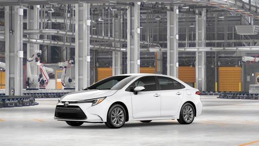 White 2026 Toyota Corolla Hybrid LE
