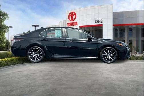 Midnight Black Metallic 2024 Toyota Camry Hybrid SE