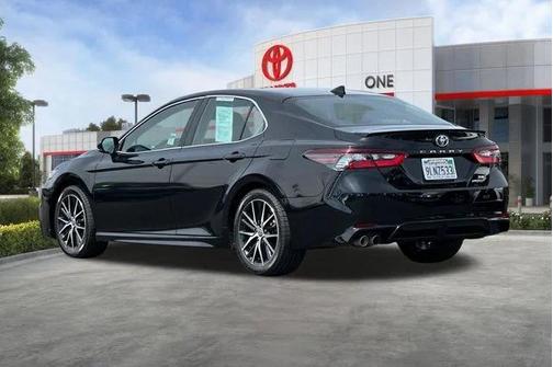 Midnight Black Metallic 2024 Toyota Camry Hybrid SE
