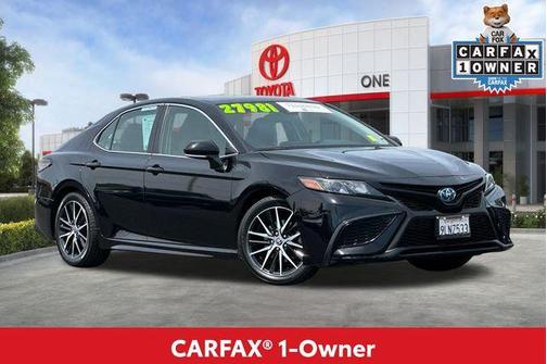 Midnight Black Metallic 2024 Toyota Camry Hybrid SE