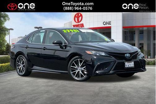 Midnight Black Metallic 2024 Toyota Camry Hybrid SE