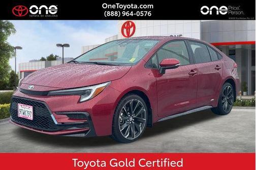 Ruby Flare Pearl 2025 Toyota Corolla Hybrid SE