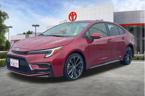 Ruby Flare Pearl 2025 Toyota Corolla Hybrid SE