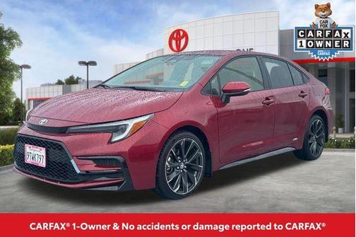 Ruby Flare Pearl 2025 Toyota Corolla Hybrid SE