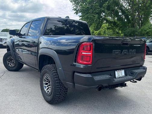 Diamond Black Crystal Pearlcoat 2026 RAM 1500 RHO Crew Cab 4x4 5'7' Box