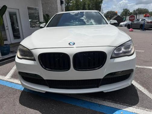 white 2014 BMW 740 Li