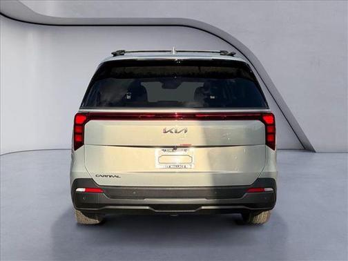 Ivory Silver 2026 Kia Carnival Hybrid SX