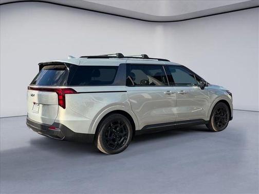 Ivory Silver 2026 Kia Carnival Hybrid SX