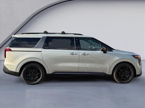 Ivory Silver 2026 Kia Carnival Hybrid SX