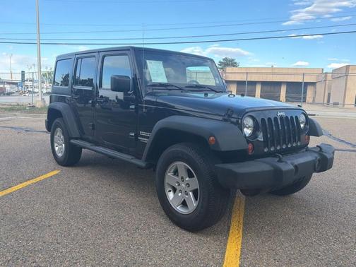 Black 2012 Jeep Wrangler Unlimited Sport