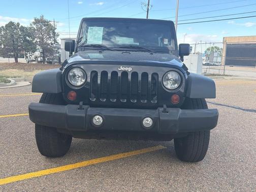 Black 2012 Jeep Wrangler Unlimited Sport