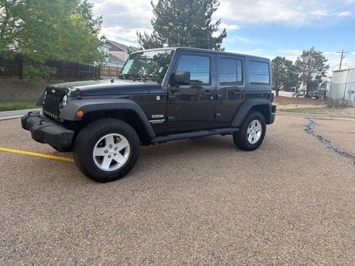 Black 2012 Jeep Wrangler Unlimited Sport