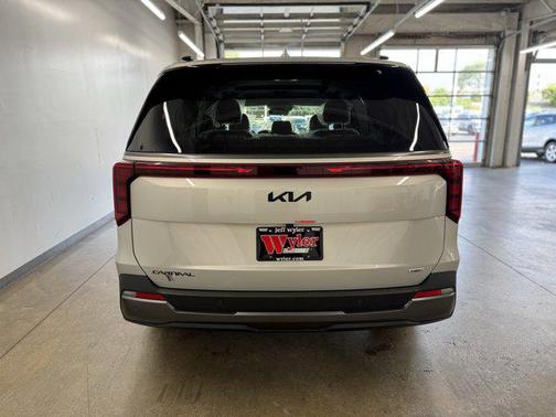 Ivory Silver 2026 Kia Carnival SX Prestige